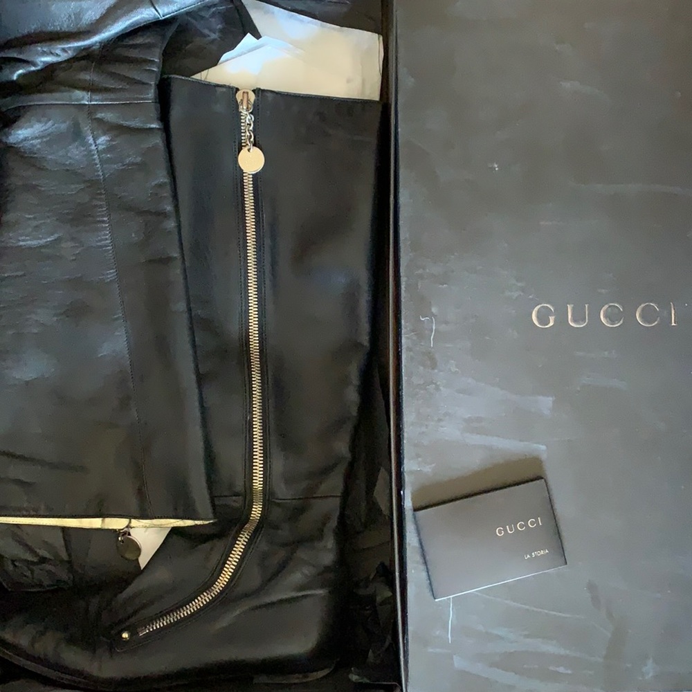 Gucci boots in black leather gold zipper size 7.5